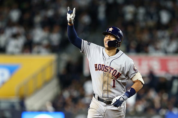 Carlos Correa celebrates a home run against the Yankees.