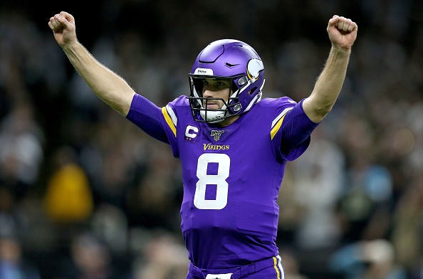 Kirk Cousins celebrates a TD for the Vikings.