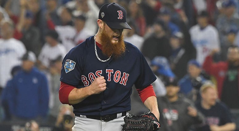 pitcher Craig Kimbrel celebrates after defeating the Los Angeles Dodgers in game four of the 2018 World Series
