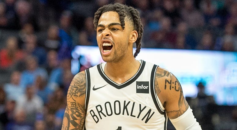 Nets guard D'Angelo Russell celebrates after making a fourth-quarter shot against the Kings on March 19, 2019, at the Golden 1 Center in Sacramento, California.