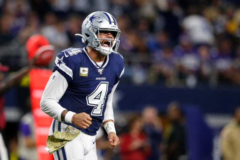 Cowboys QB Dak Prescott celebrates a TD.