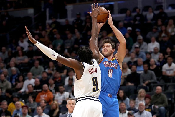 Danilo Gallinari shoots over a defender during a Thunder game.