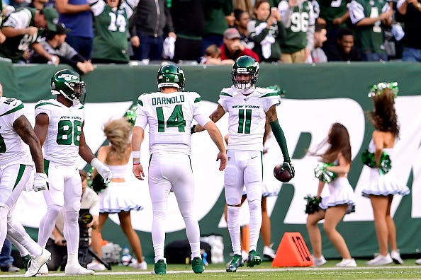 Sam Darnold celebrates with Robby Anderson after a Jets TD.