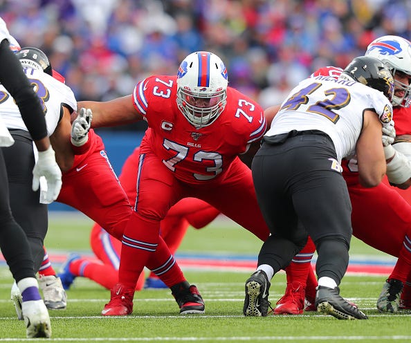 Dion Dawkins blocks for the Bills in a game against the Ravens.