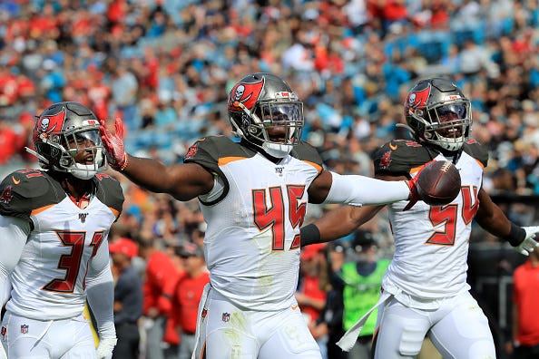 Devin White celebrates coming up with the ball for the Bucs.