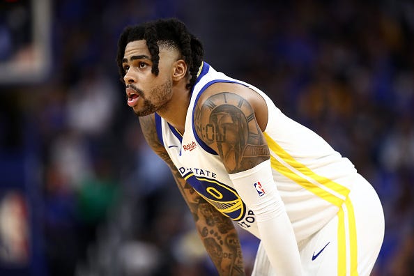 D'Angelo Russell stares up at the basket during a Warriors game.