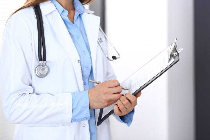 doctor with clipboard