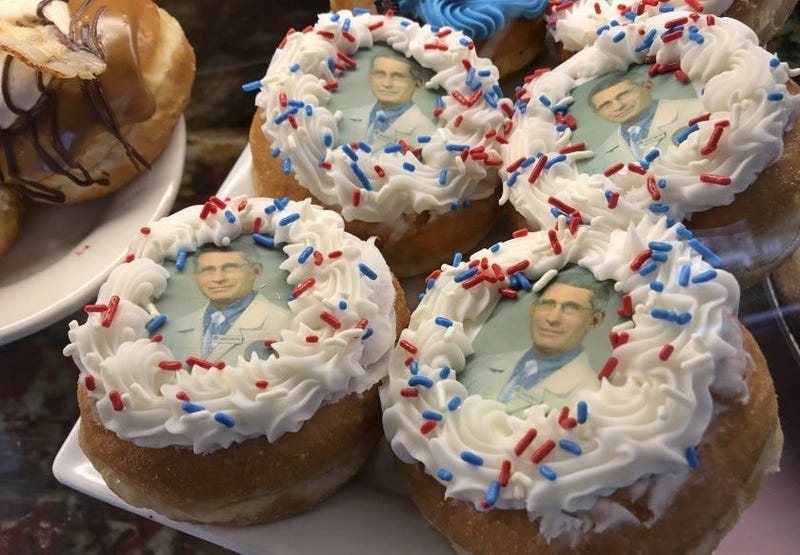 donuts bearing the likeness of Dr. Anthony Fauci, director of the National Institute of Allergy and Infectious Diseases, rest on a plate at Donuts Delite in Rochester, N.Y. Donuts Delite began making donuts featuring Fauci’s face earlier in the week.