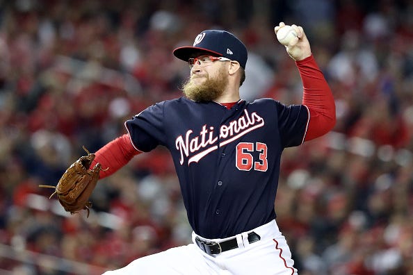 Sean Doolittle pitches in the World Series.
