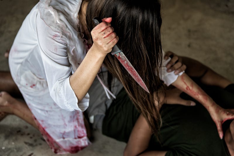 Zombie woman or Woman Ghost holding knife will kill man people