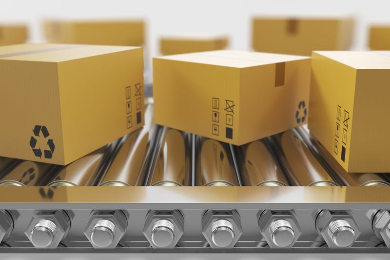 Recycled packaging on conveyor belt