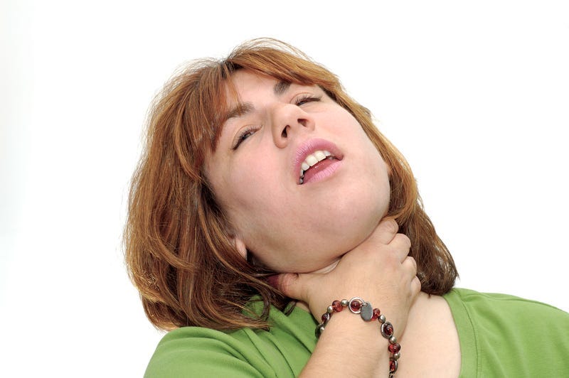 Woman Choking herself.