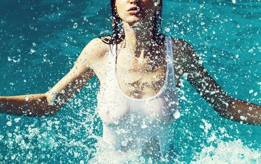Pretty woman in swimming pool