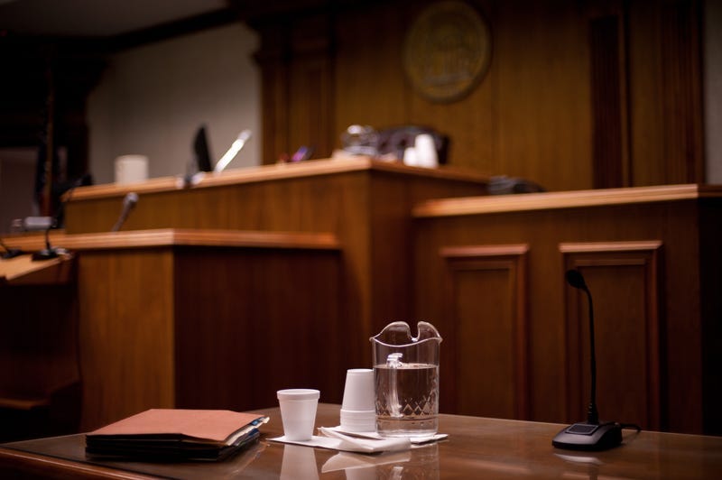 Photograph of a courtroom using shallow depth of field.