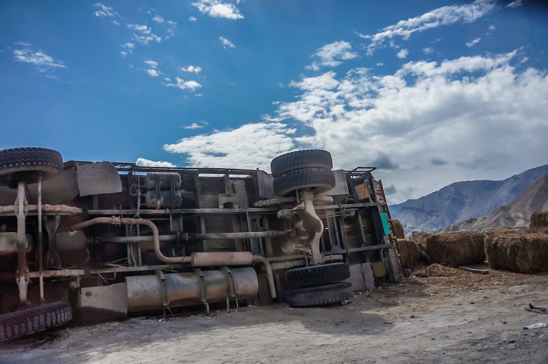 Truck crashed on high mountain road.