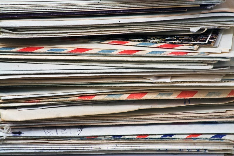 A big pile of old letters and mail.