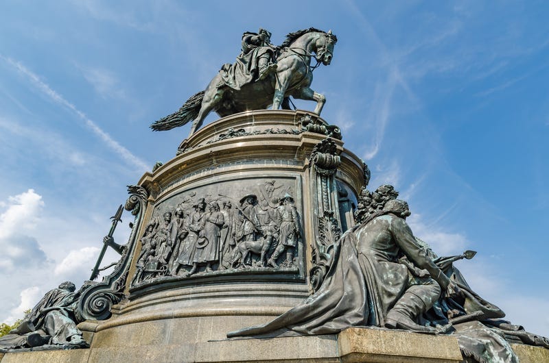 The bronze and granite statue of George Washington on horse in Philadelphia, Pennsylvania, along the Benjamin Franklin Parkway.