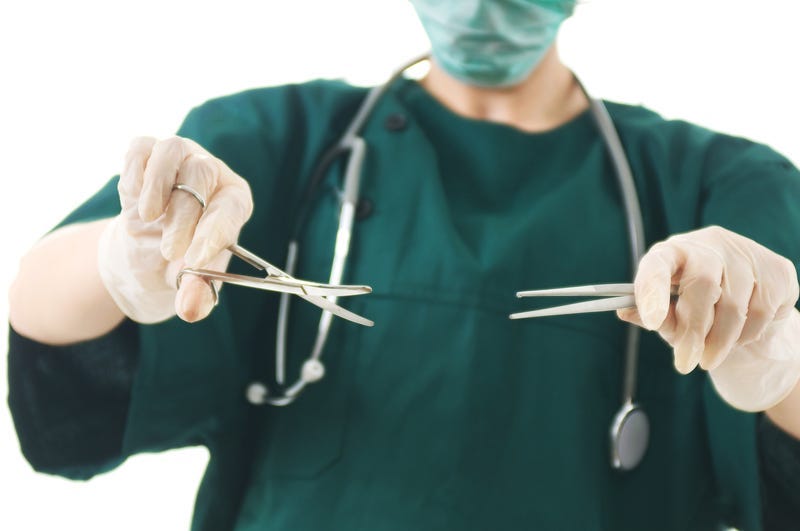Surgeon with medical tools