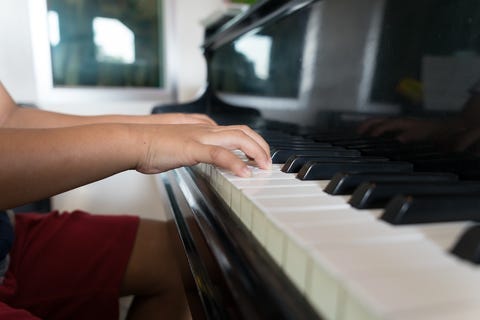 Kid playing the piano