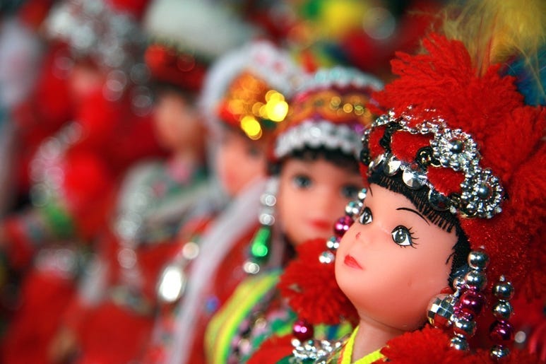 Colorful dolls dressed in traditional Hmong tribe