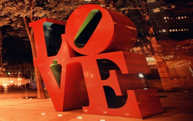 Autumn night photo shot of LOVE sculpture in the city of Shinjuku Tokyo Japan.