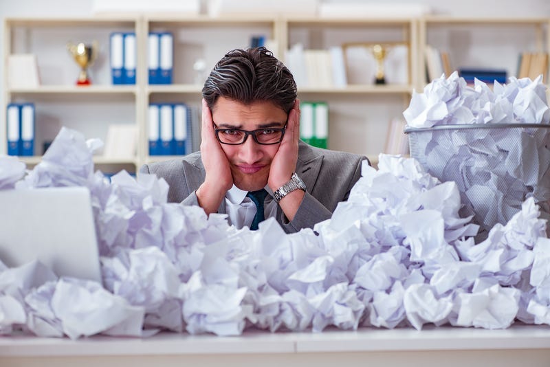 The businessman in paper recycling concept in office