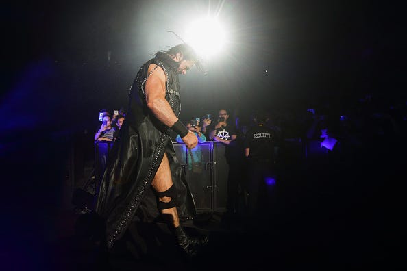 WWE star Drew McIntyre enters the ring in Singapore.
