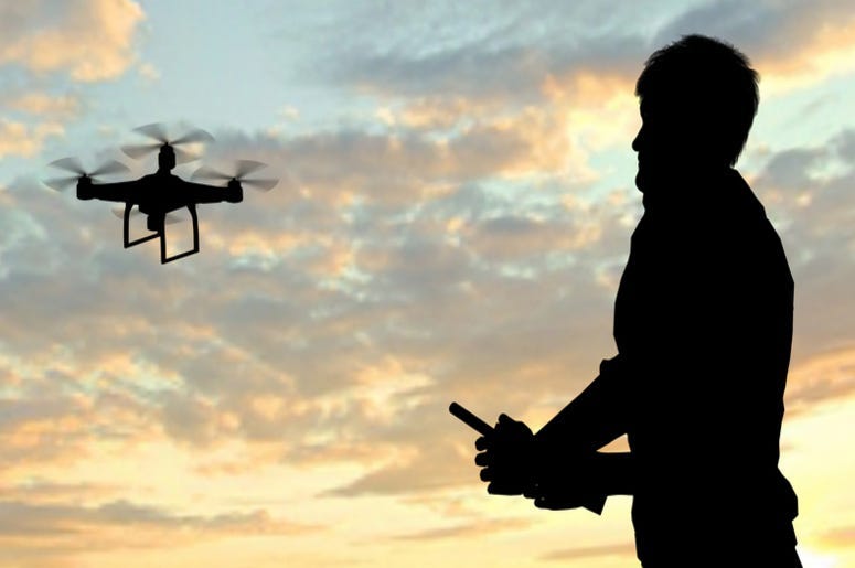 Man operating of flying drone