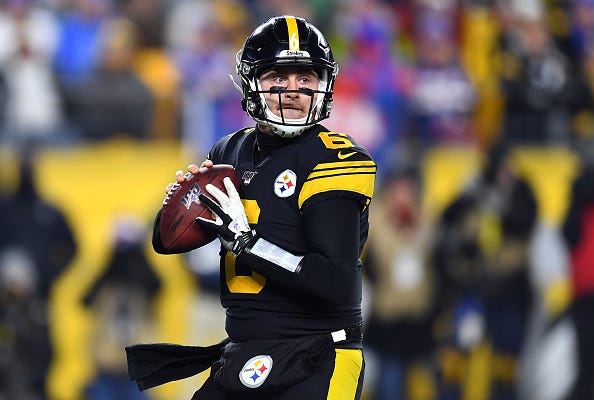 Devlin Hodges looks to make a pass against the Bills.