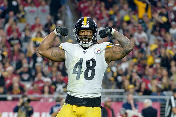 Bud Dupree flexes after recording a sack.