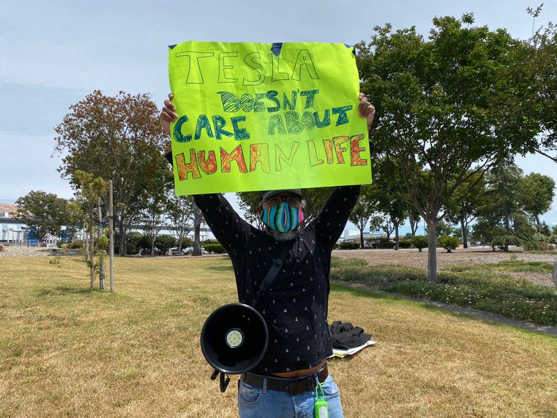 Tesla Workers Rally to Demand Stronger Safety Measures After Positive Tests