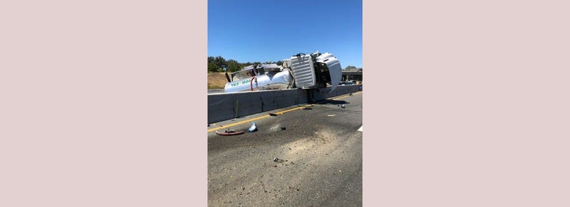 A sanitation truck overturned on Highway 101, spilling sewage onto the roadway on Aug. 14, 2019.