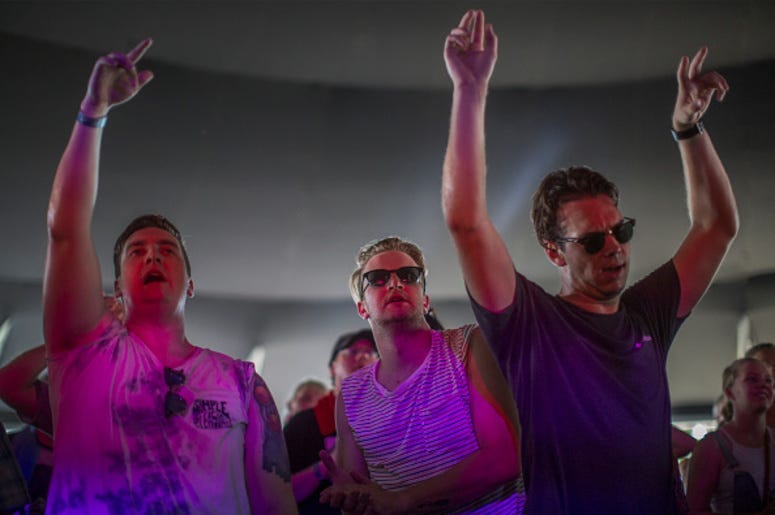 Men dancing at festival