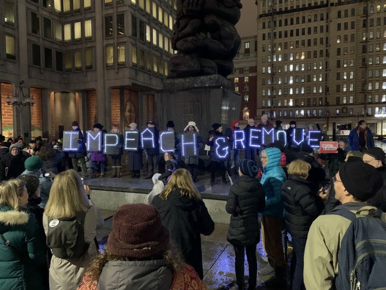 Protesters in Center City calling for the president's impeachment.