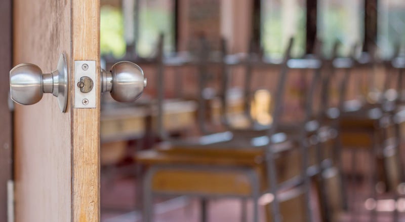 And open door shows an empty classroom