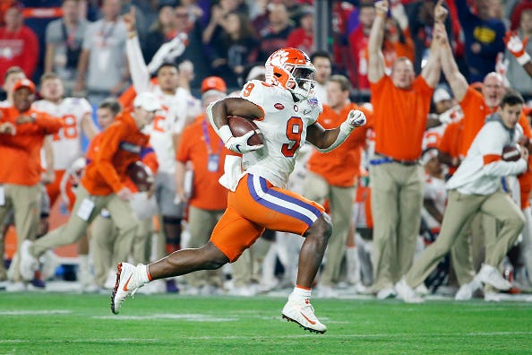 Clemson RB Travis Etienne rushes for a TD in the Fiesta Bowl.