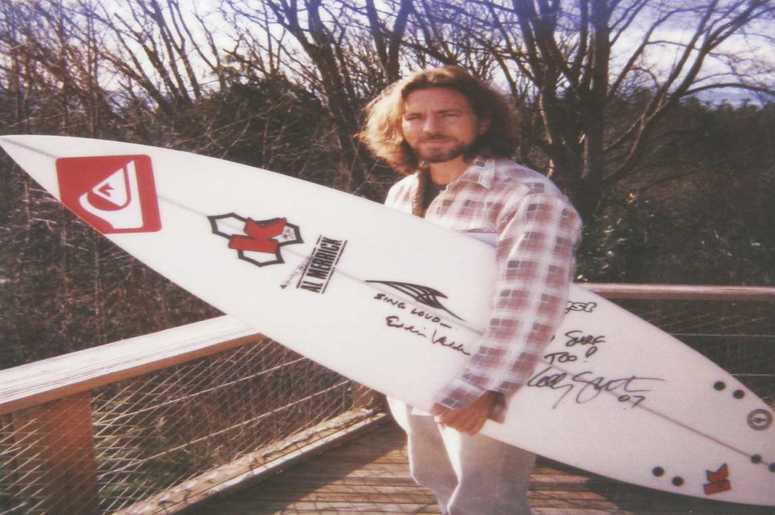 Eddie Vedder with signed surf board