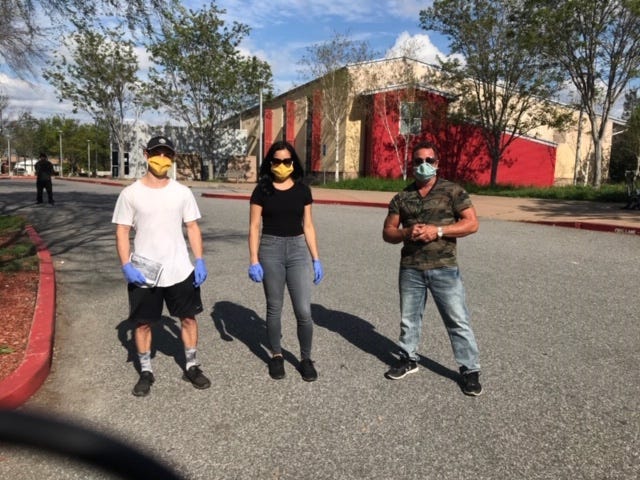 Taylor Marques, Vanessa Villareal, Pastor Scott Wagers in front of the Tully Community Branch Library in San Jose after completing homeless outreach trips