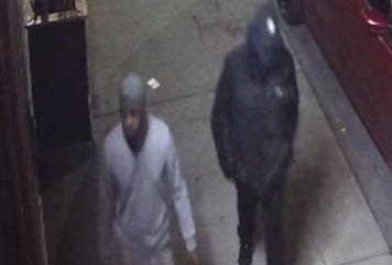 Police are looking for these two men in connection with an armed robbery and attack in Detroit.
