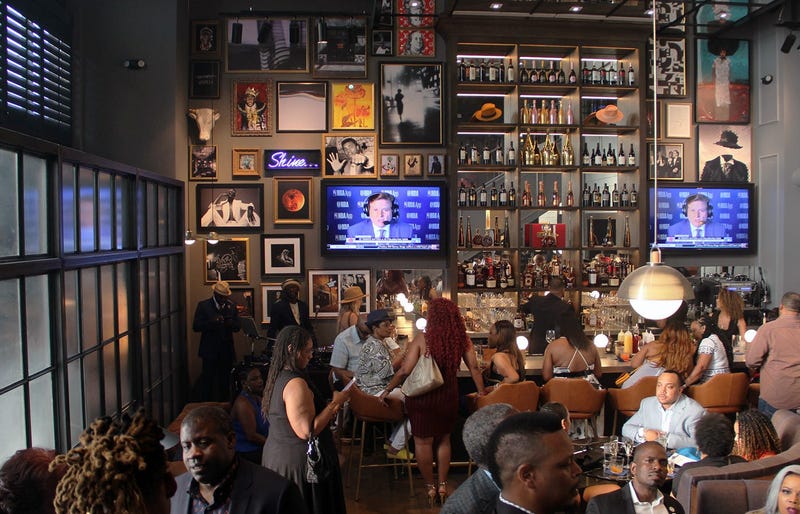 The bar on the main floor inside Cam Newton's Fellaship lounge in Atlanta