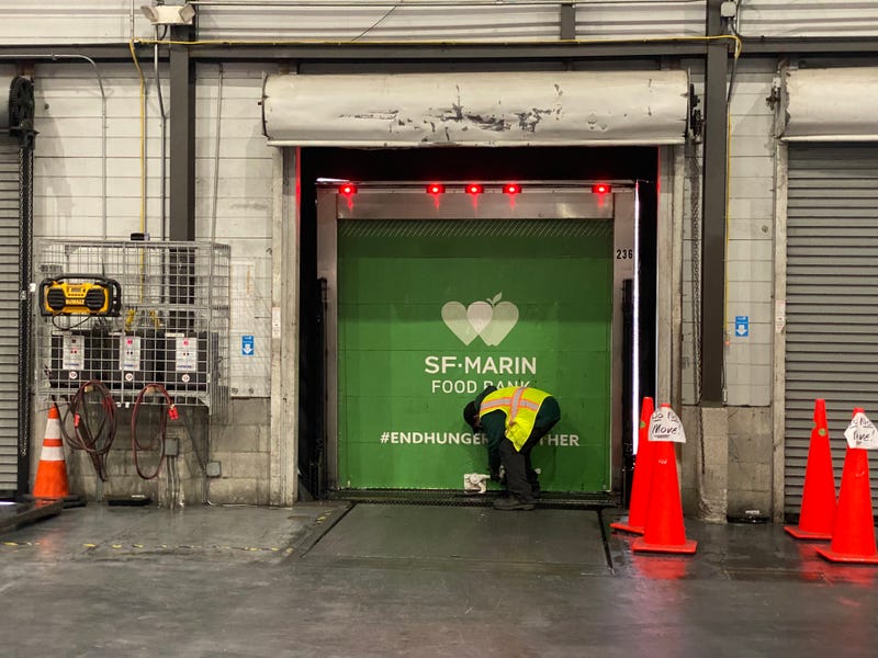 A worker readies for an incoming shipment of food at the San Francisco-Marin Food Bank.