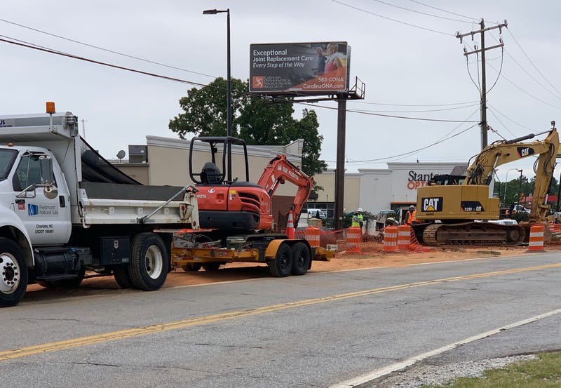 Piedmont Natural Gas workers repair gas leak caused by road construction crew.