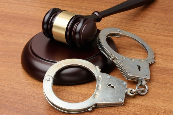 Gavel and handcuffs