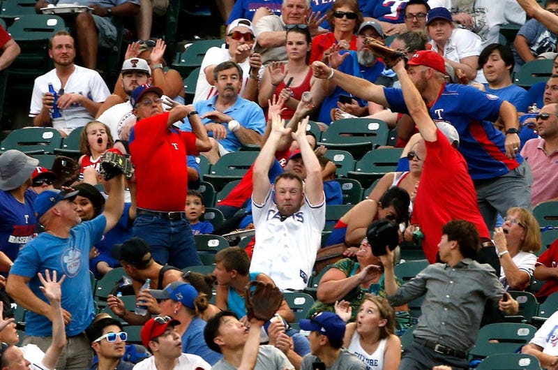 Nacho man' fan who fell chasing home run ball gets chips, pizza, ball from  Reds pitcher, wife