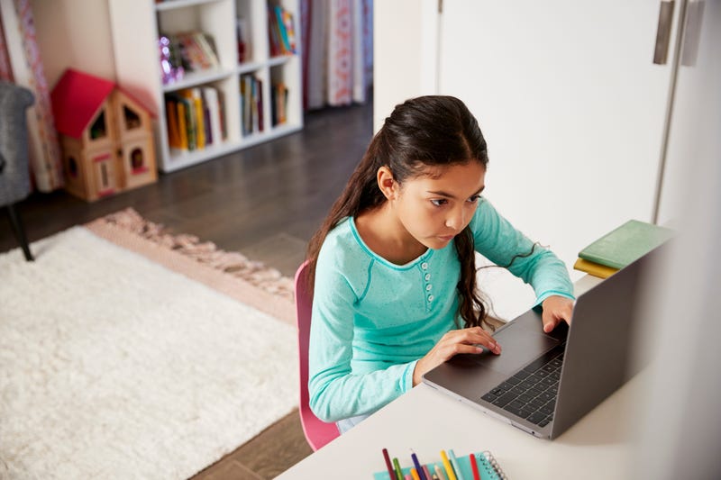 Child working on computer