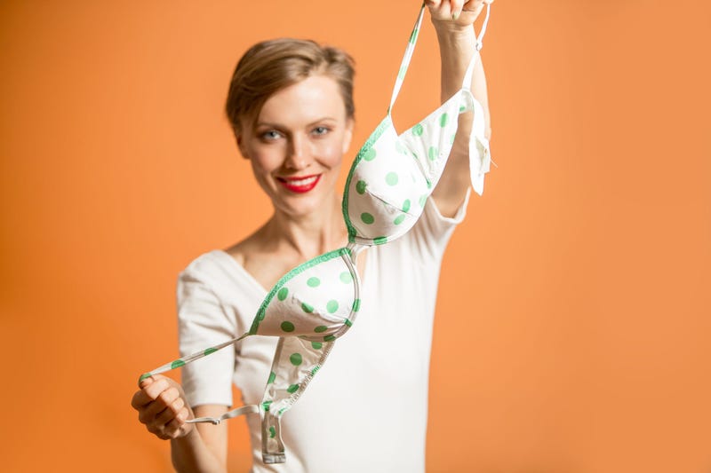Woman Holding Bra