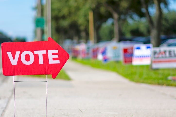 Sign directing voters.