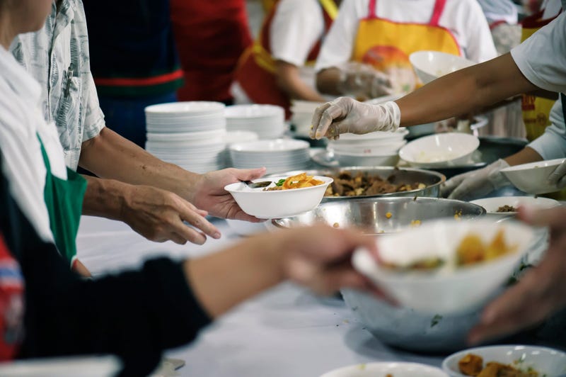Volunteers handing out food