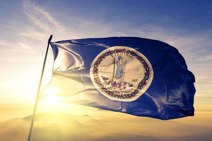Virginia state of United States flag textile cloth fabric waving on the top sunrise mist