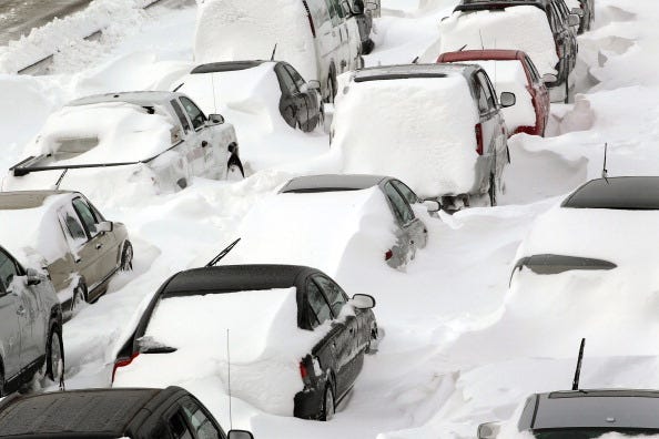 Cars sit in the northbound lanes of Lake Shore Drive after accidents and drifting snow stranded the drivers during last night's blizzard February 2, 2011 in Chicago, Illinois. As of late morning over 20 inches of snow had fallen, making this snowstorm the